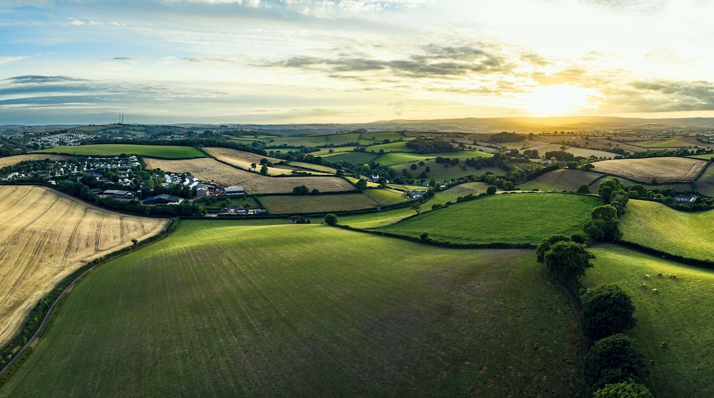Sunset over Farmlands and Fields from a drone, Devon, England, Europe
