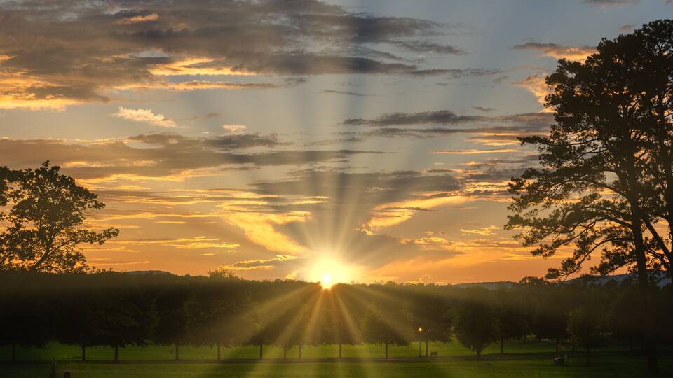 Beautiful sunset with sun rays on West Georgia Mountains
