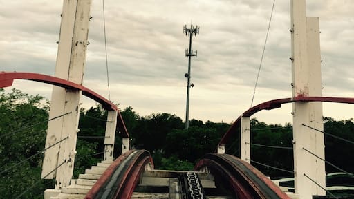 "The Point of No Return" at the top of the lift hill of one of the oldest wooden roller coasters in the world. A thrilling ride that speeds through a figure eight along the shore of West Lake Okoboji.