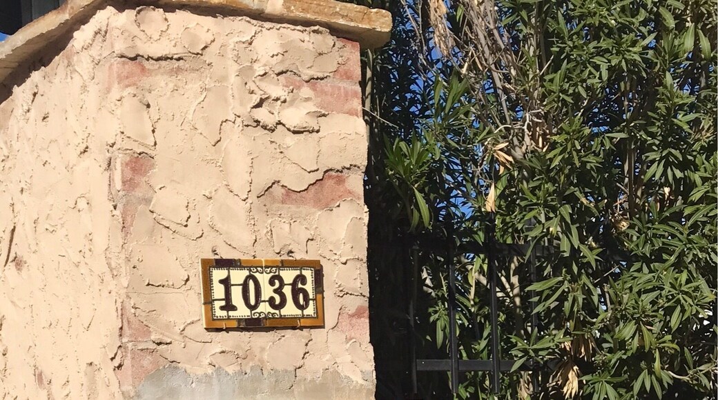 The entrance to this Mexican hacienda with its vintage pots and traditional tile work caught more of my attention than the actual home.