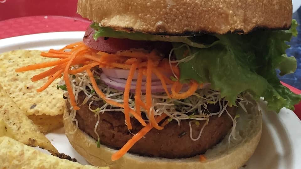 The Beyond Burger at Nature’s Health food and Cafe. My meat loving husband loved the taste, texture and juicy meatiness of the gluten-free patty. #food&drink #culture.