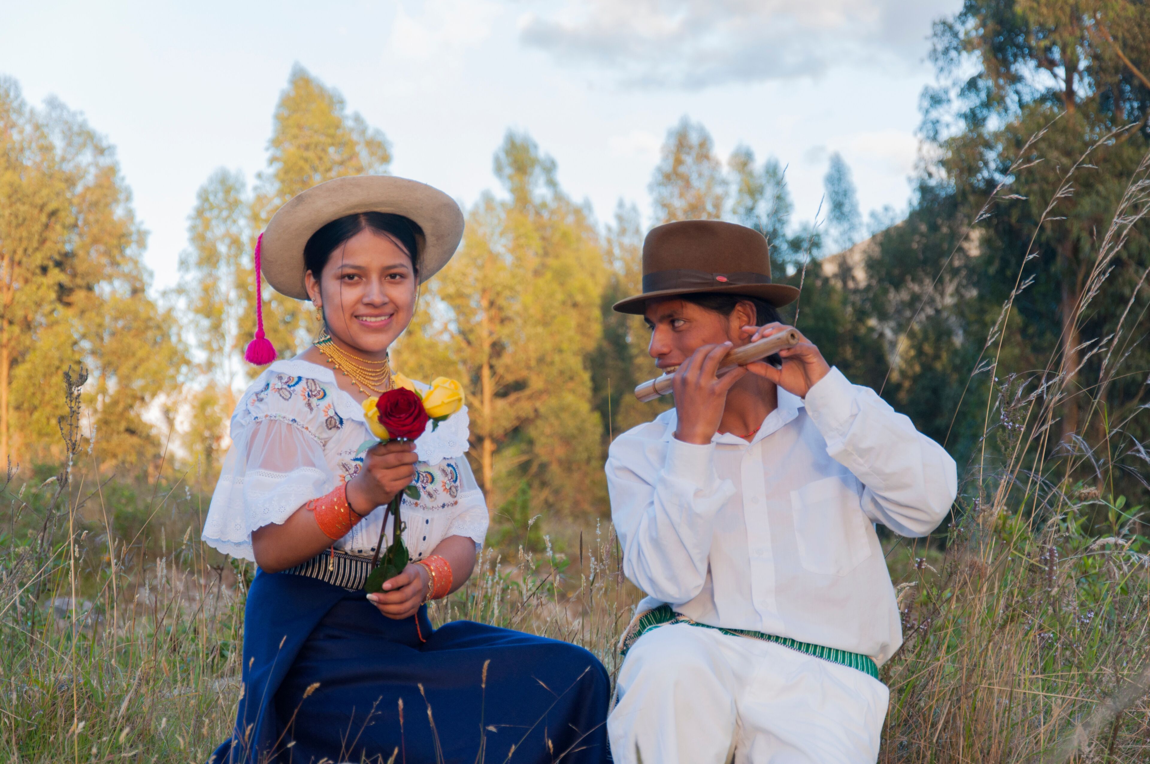 Otavalo musicians playing andean music in ecuadorian countryside