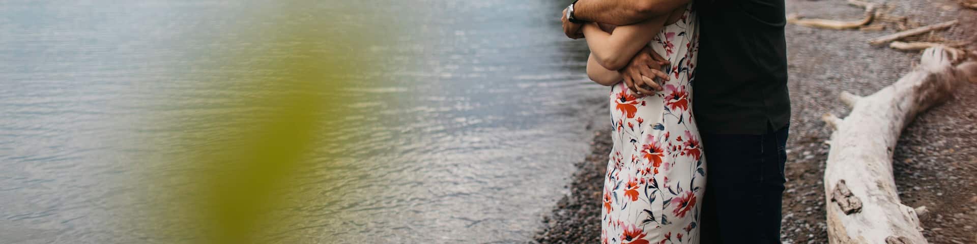 Romantic couple hugging on beach, Oshawa, Canada