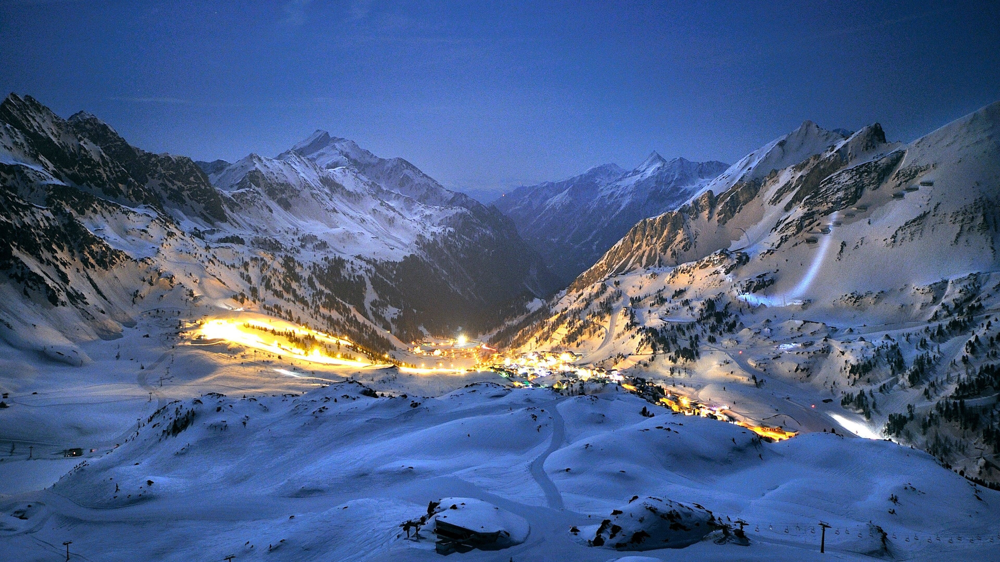 Obertauern featuring snow, night scenes and mountains