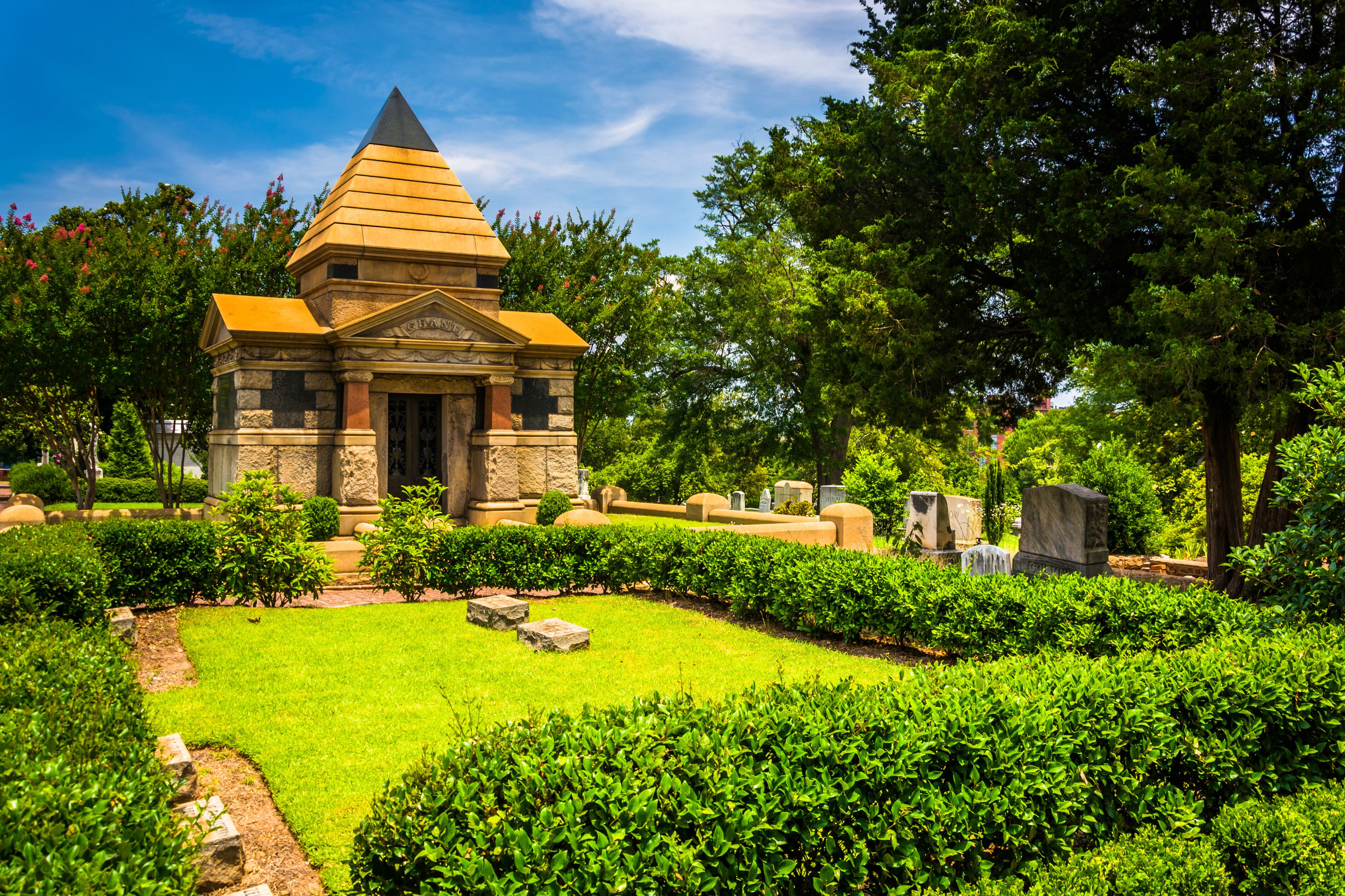 Bushes and mausoleum at Oakland Cemetary in Atlanta, Georgia.