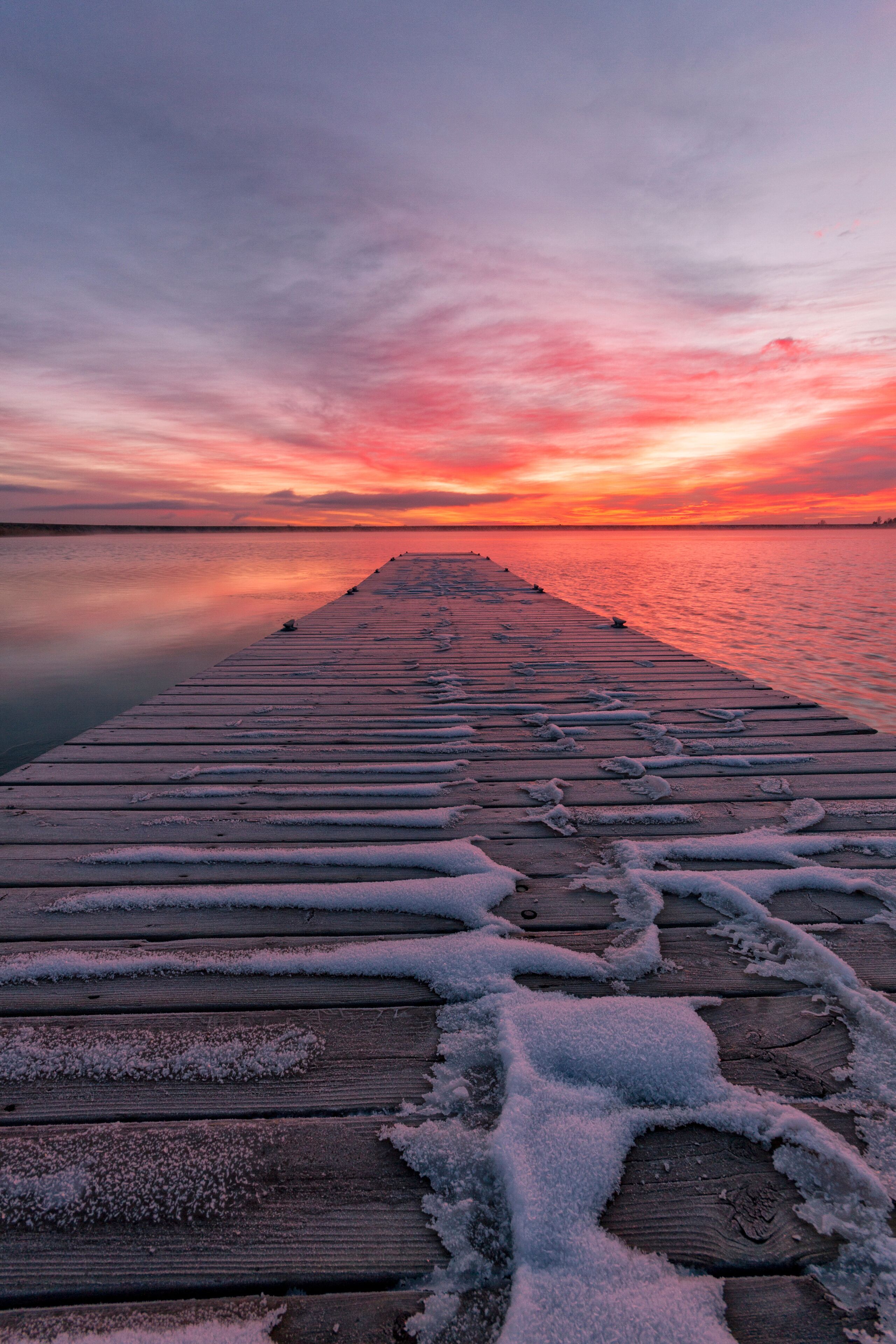Colorful Colorado Sunrise with beautiful clouds and a fishing dock