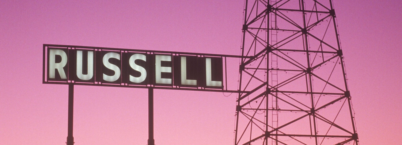 Obsolete oil rigs at sunset, Russell, KS