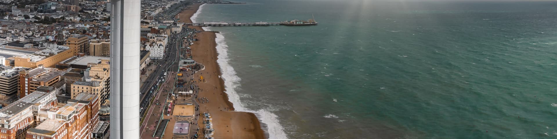 Aerial view of British Airways i360 observation deck in Brighton, UK. Beautiful tower with tourists exploring Brighton by the sea with an amazing view.