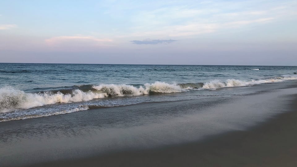 Walking the beach of Corolla.