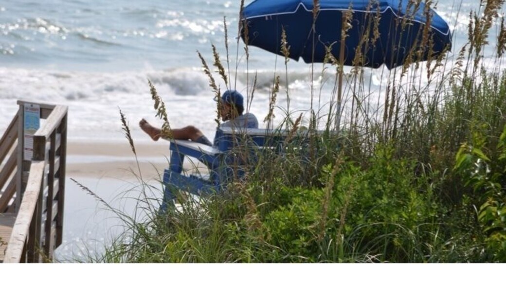 A day at the Beach - a watchful Lifeguard keeping an eye on the people in the surf!