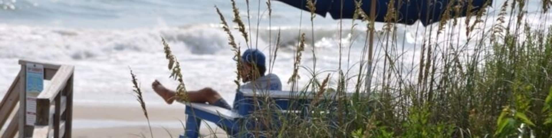A day at the Beach - a watchful Lifeguard keeping an eye on the people in the surf!
