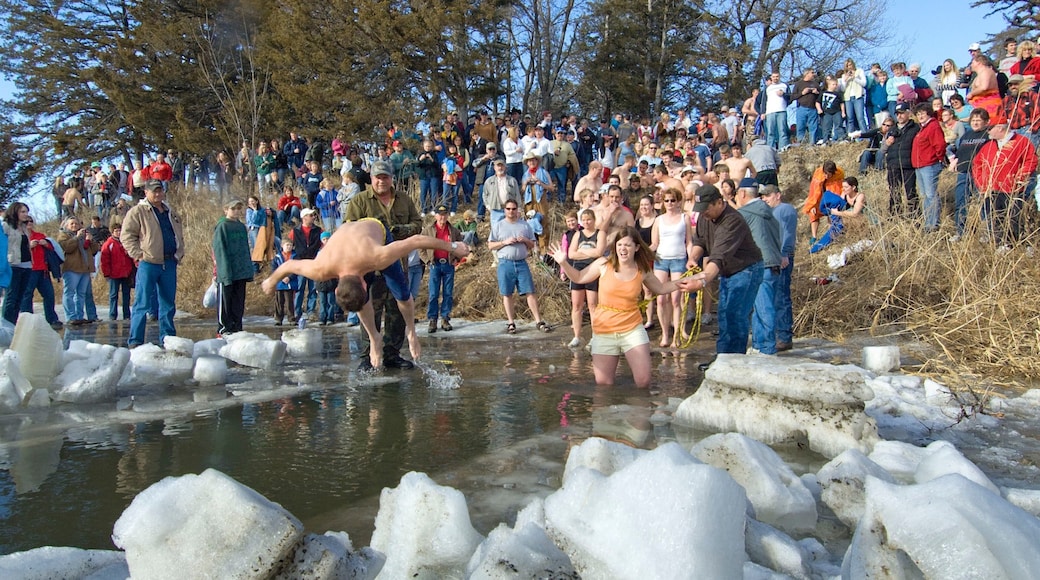 Ainsworth showing swimming as well as a large group of people