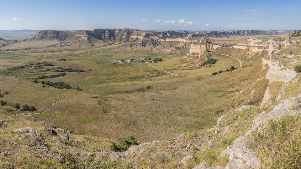 Panorama from the South Overlook of Scotts Bluff National Monument with the access road, the Oregon Trail and Mitchell Pass