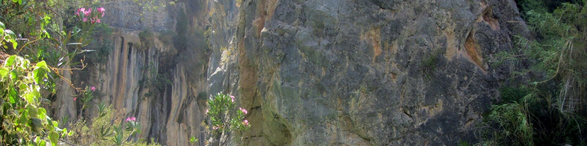 Clear blue waters and a stunning canyon surround this little river near the town of Montanejos, Spain. It is a short drive from the big town of Valencia, and was my favorite place to escape the city and the heat when I lived in Valencia. Hardly any crowds, you can swim down the calm springs to find underwater caves, mini waterfalls, and of course nearby restaurants in the town for sangria and tapas. #LiveLikeALocal