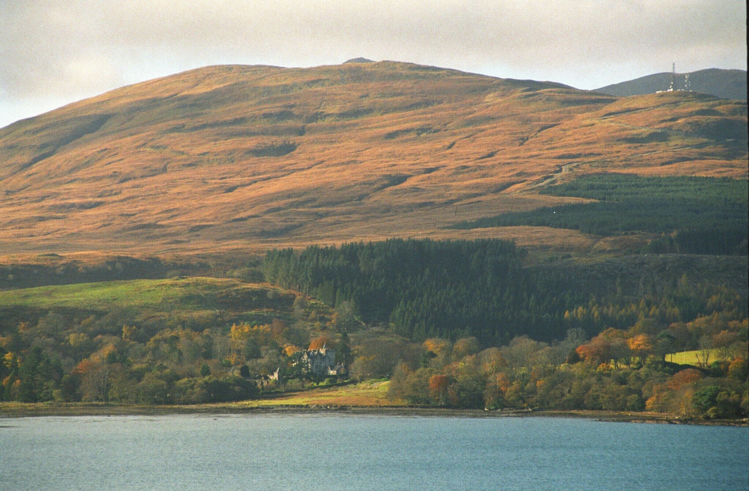 Taken from Duart Castle, Torosay Castle sits beneath the hills.  Autumnal colours are coming in.
