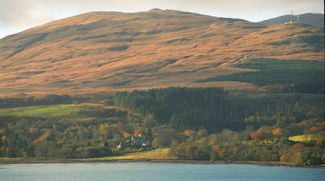 Taken from Duart Castle, Torosay Castle sits beneath the hills. Autumnal colours are coming in.