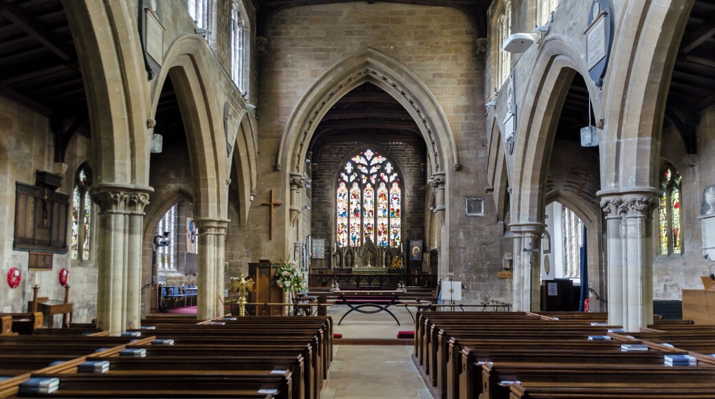 The church dates from the early 13th century onwards, and was restored in 1859-61 by Ewan Christian. It is built in green sandstone and has a west tower with spirelet, nave with north and south aisles, chancel with north and south aisles, north porch and vestry. The tower dates from circa 1200, and was remodelled in 1861. The upper part is from the decorated period. The nave arcades are of five bays and date from the early 13th century. These were restored in 1861. The chancel has 15th century arcades, two to the north and three south, again heavily restored. The chancel arch dates from the Victorian restoration. The reredos also dates from this time, and is by C. E. Giles. There is a Memorial brass to Sir Lionel Dymoke, died 1519, he was knighted at Siege of Tournai, and was Sheriff of Lincolnshire 1516. On the wall of the south aisle are mounted 13 scythes, which were thought to have been used in the Lincolnshire rising of 1536, although this is unlikely , despite Horncastle being one of the centres of the rebellion. There are several stained-glass windows, with some by Heaton Butler and Bayne, and one by Preedy. The church pipe organ was recently replaced with a new digital version. The freed up space has been converted into a Coffee area.