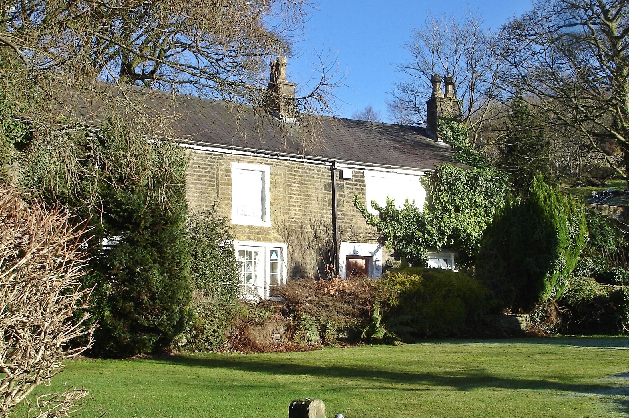 Marklands House, Horwich, Bolton, UK. A 17th-century Grade II listed building. Extension dated 1746 over door.