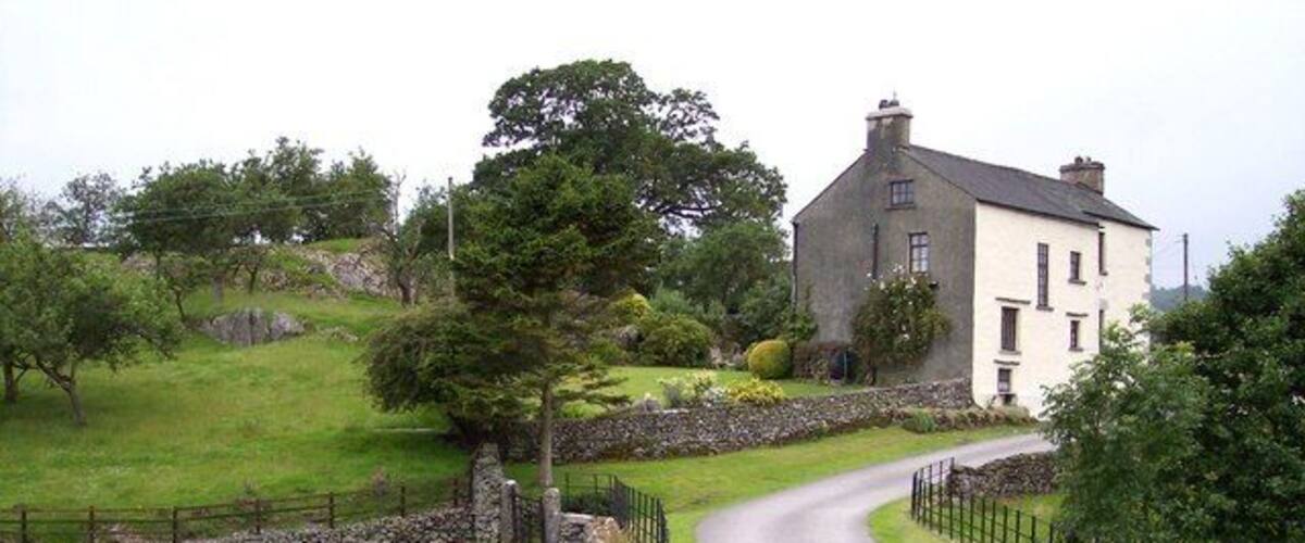 Kirkby House Viewed from bridge over River Pool