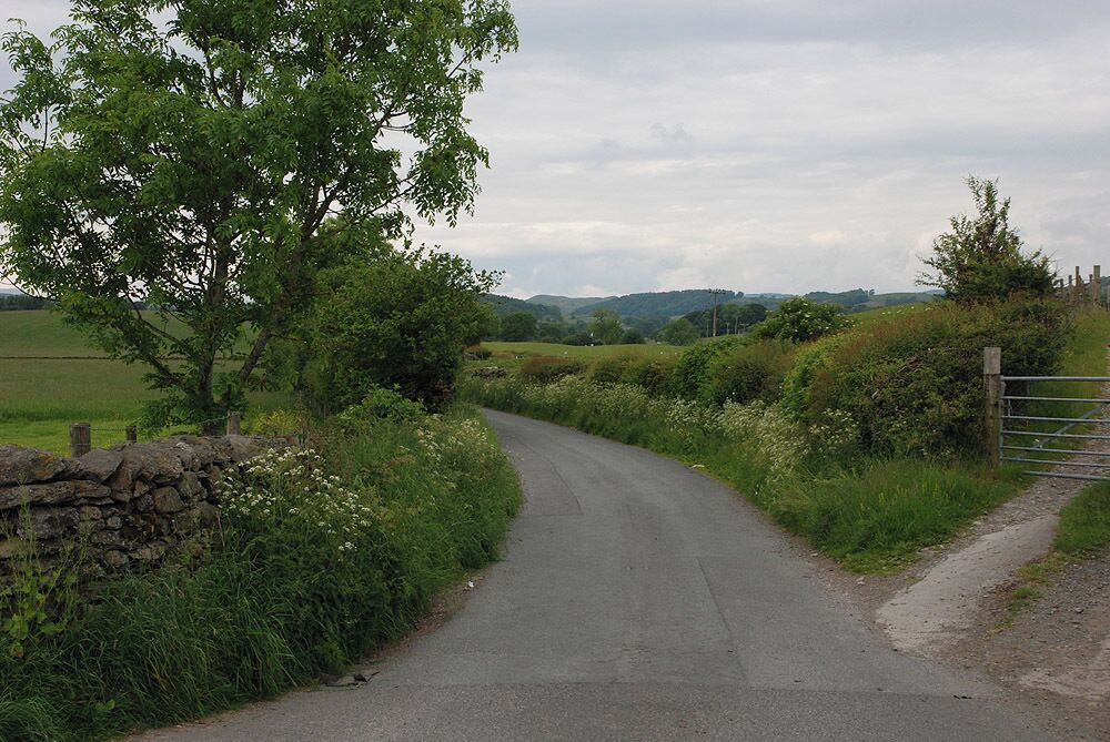 Minor road to Bowston At the junction with Hall Road.