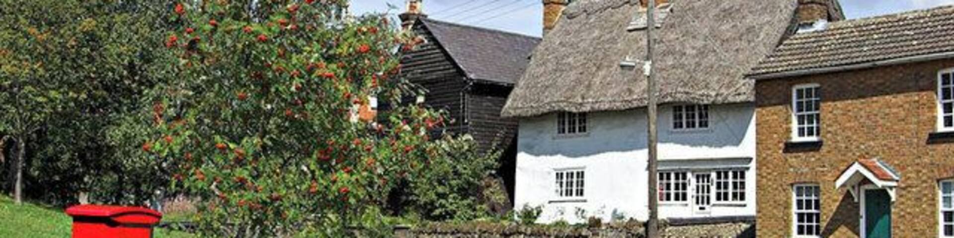 Heath Green. Heath Green in Heath and Reach with period cottages and a modern Post box!