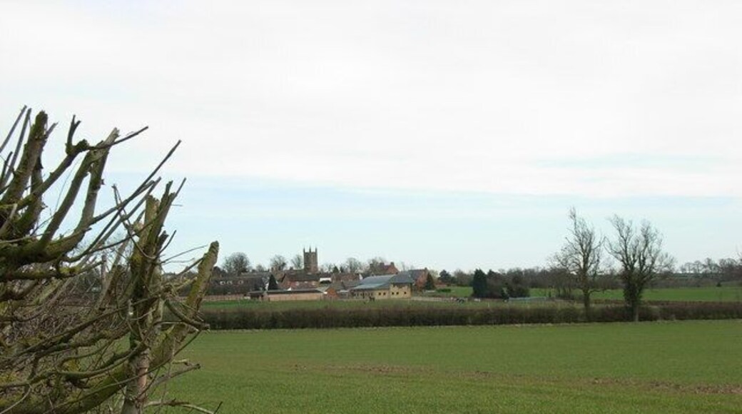 Frolesworth view A view of Frolesworth from the Sharnford road. The photograph was taken from just inside the top left hand corner of this square. The hedge at the left hand side of the image is the boundary of the field and the road.