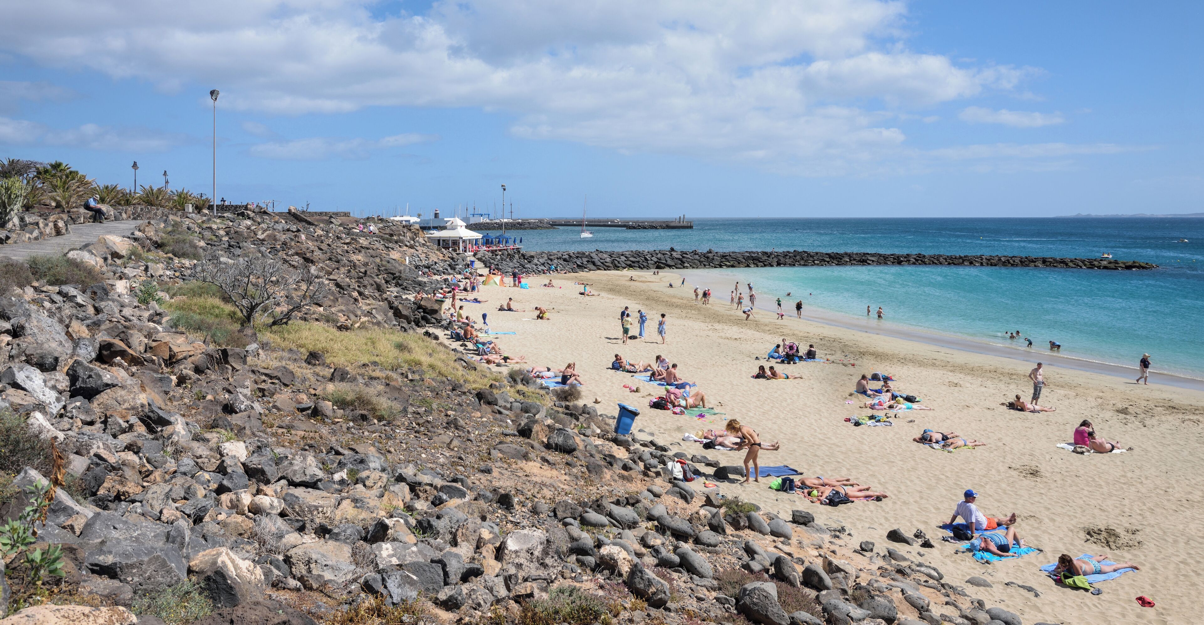 Lanzarote, Playablanca: the beach towards the marina. The isle of Fuerteventura is seen in the right background.