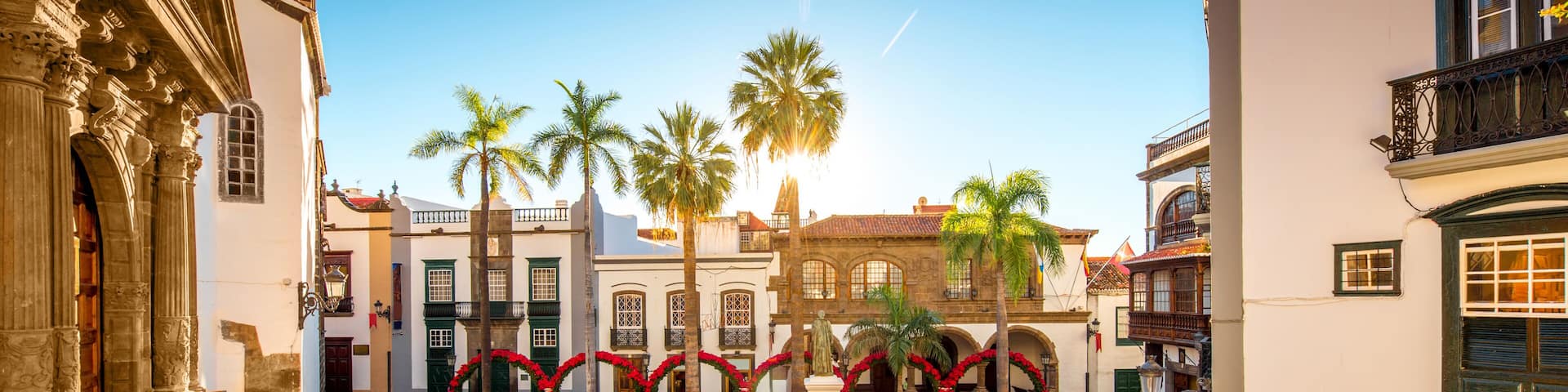 Central square in old town with Salvador church and monument in Santa Cruz de la Palma in Spain