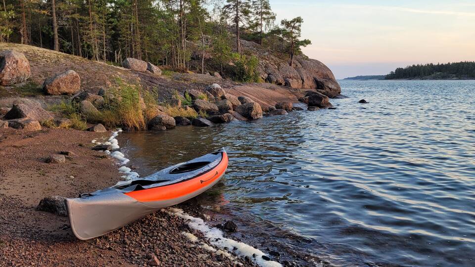 Two Kayaks Resting on the Shoreline in Bush Bay Near Cedarville Michigan Lake Huron