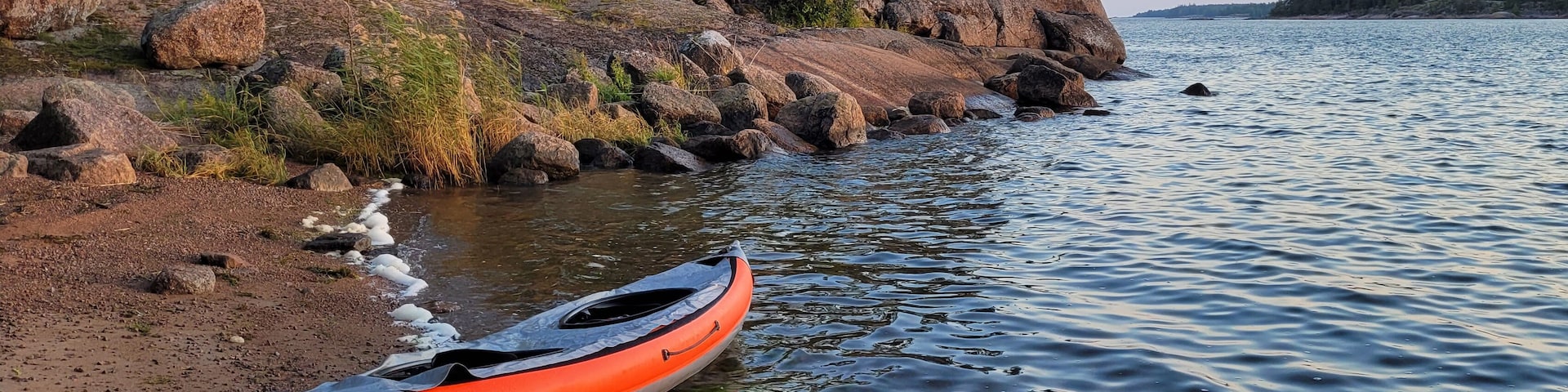 Two Kayaks Resting on the Shoreline in Bush Bay Near Cedarville Michigan Lake Huron