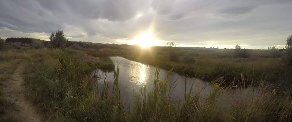 Swollen, swirling clouds on our hike through this wildlife refuge. Its a long ways from anything but pretty awesome to hike through.