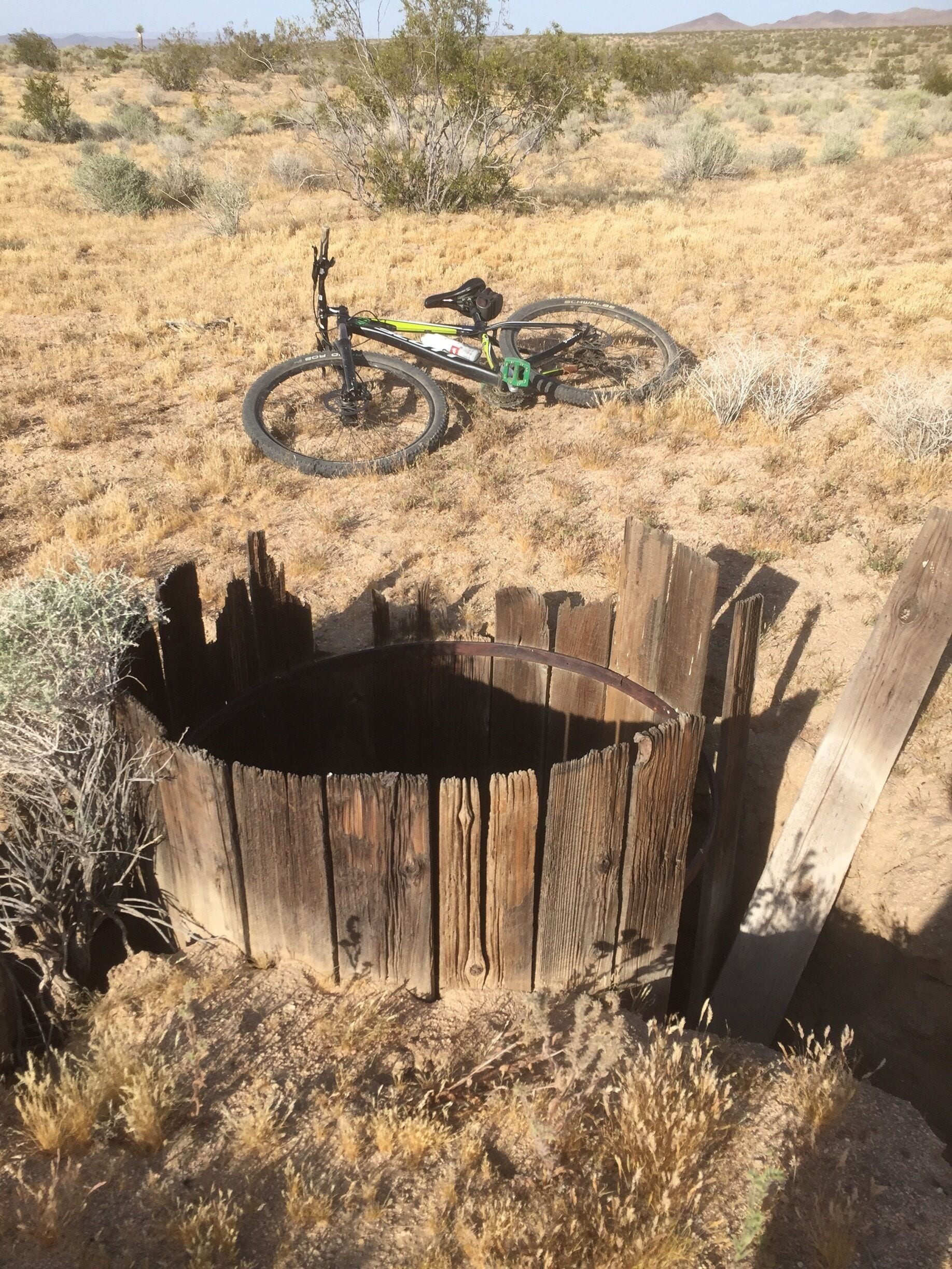 An abandoned mine shaft - off the beaten path, but near several dirt roads. 