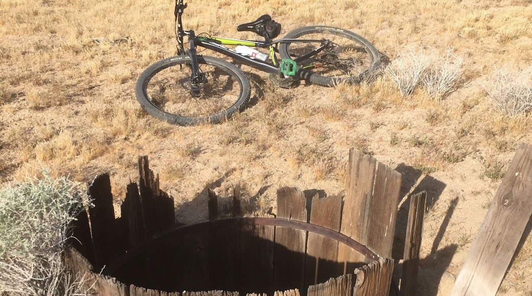 An abandoned mine shaft - off the beaten path, but near several dirt roads.