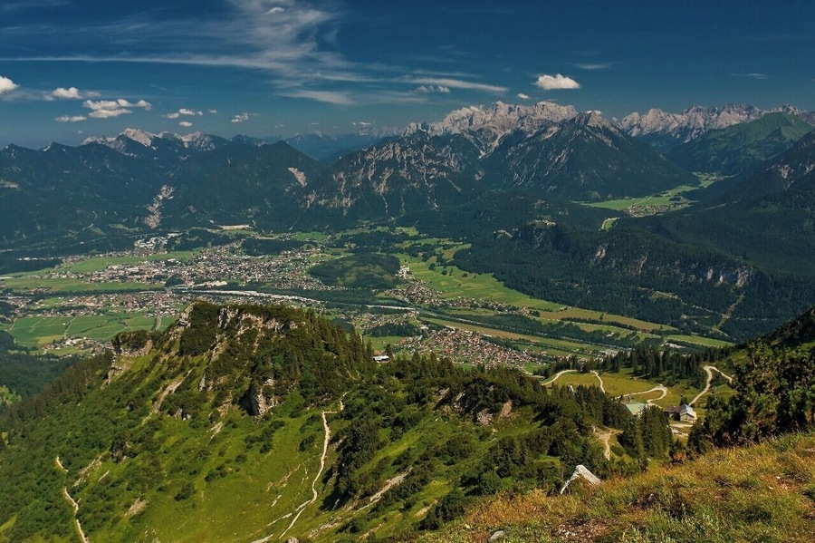 July 2015
Town Reutte, Tyrolia, Austria
Reutte is a market town in the Austrian state of Tyrolia. Reutte is located in the altitude of 853 meters on the Lech river, and has a population of 6,210.
The name "Reutte" has its origin in "roden" or "reuten" meaning glade.
Reutte is a popular holiday resort and its proximity to the famous Bavarian Castles of Neuschwanstein, Schwangau or the Ehrenberg ruins make Reutte a cultural destination as well as a skiing destination.
View from Hahnenkamm in Tannheimer Berge. In the background you can see Zugspitze and Wetterstein mountain ranges.