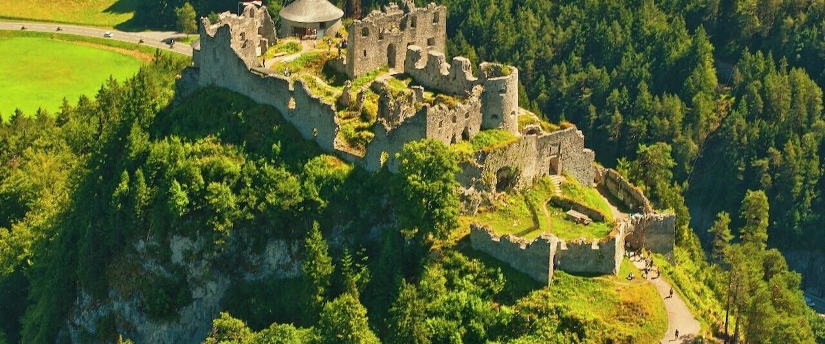 July 2015
Castle ruin Ehrenberg, Austria
This castle ruin is located south of Reutte in altitude 1.100 meters just over the Highway 179 which connects Reutte and Lechtal valley with the rest of Tyrol land (through the Fernpass saddle). The castle was built ca. 1290 and was used to guard the strategic road to Reutte and this part of Austria. It ceased its function in 1782. It is the middle castle, there is the higher Schlosskopf, lower Klause and Fort Claudia, which is connected with the famous Highline 179 hanging bridge over the highway.