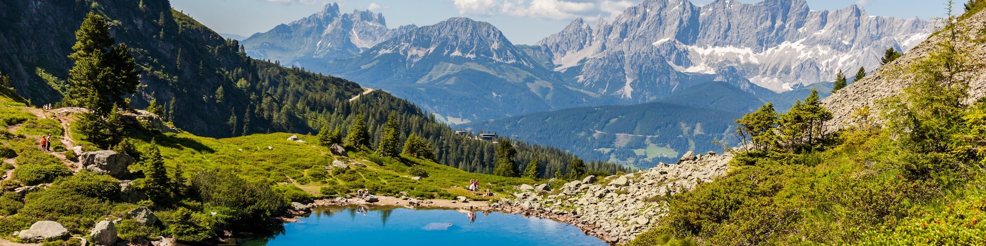 Lake Spiegelsee Mittersee and mountain range Dachstein in Austrian Alps