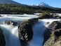 Nice waterfalls with snowcap mountains behind