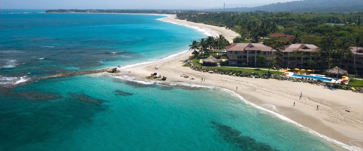 Cabarete showing general coastal views, a beach and a luxury hotel or resort
