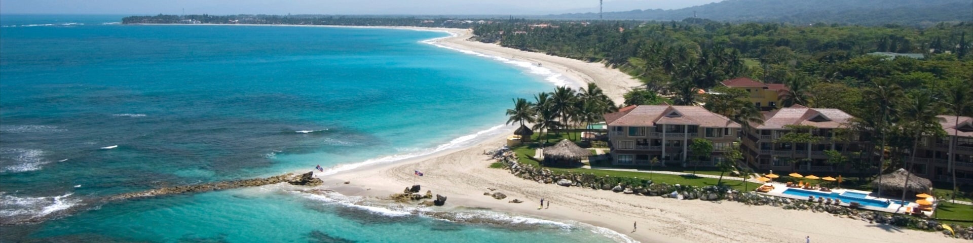 Cabarete which includes a luxury hotel or resort, tropical scenes and a beach