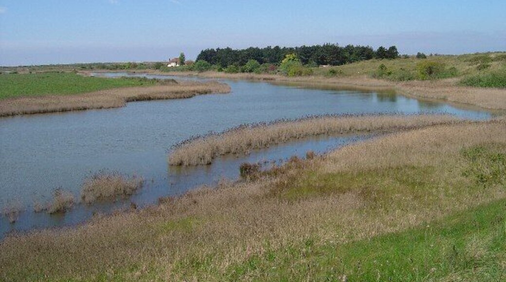 Broad Water. Looking SW across Broadwater a lagoon behind the dunes at Holme nature reserve. The building in the distance is the visitor centre for the reserve.
