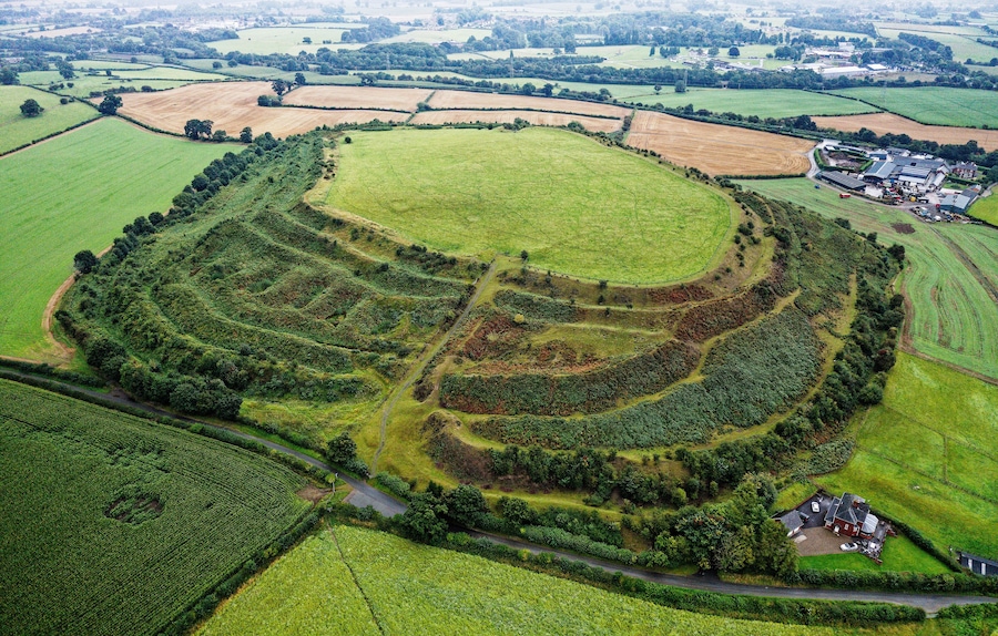Old Oswestry early Iron Age hillfort, Shropshire, England. One of the best preserved in UK. Looking N.E. over the western entrance. Aerial late summer