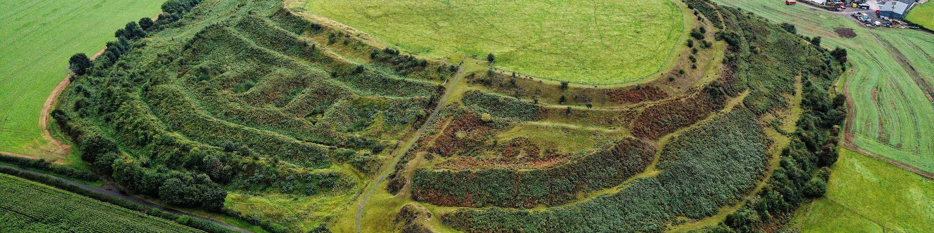 Old Oswestry early Iron Age hillfort, Shropshire, England. One of the best preserved in UK. Looking N.E. over the western entrance. Aerial late summer