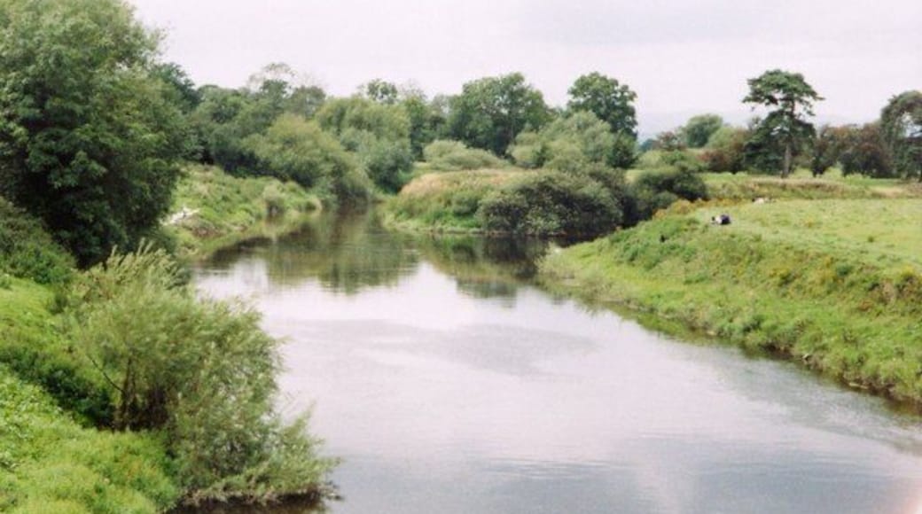 Confluence of rivers and joining of countries The River Severn on the left is joined by the Afon Vyrnwy on the right. The boundary between Wales (left) and England (right) is along the centre of the combined river before following the Vyrnwy.