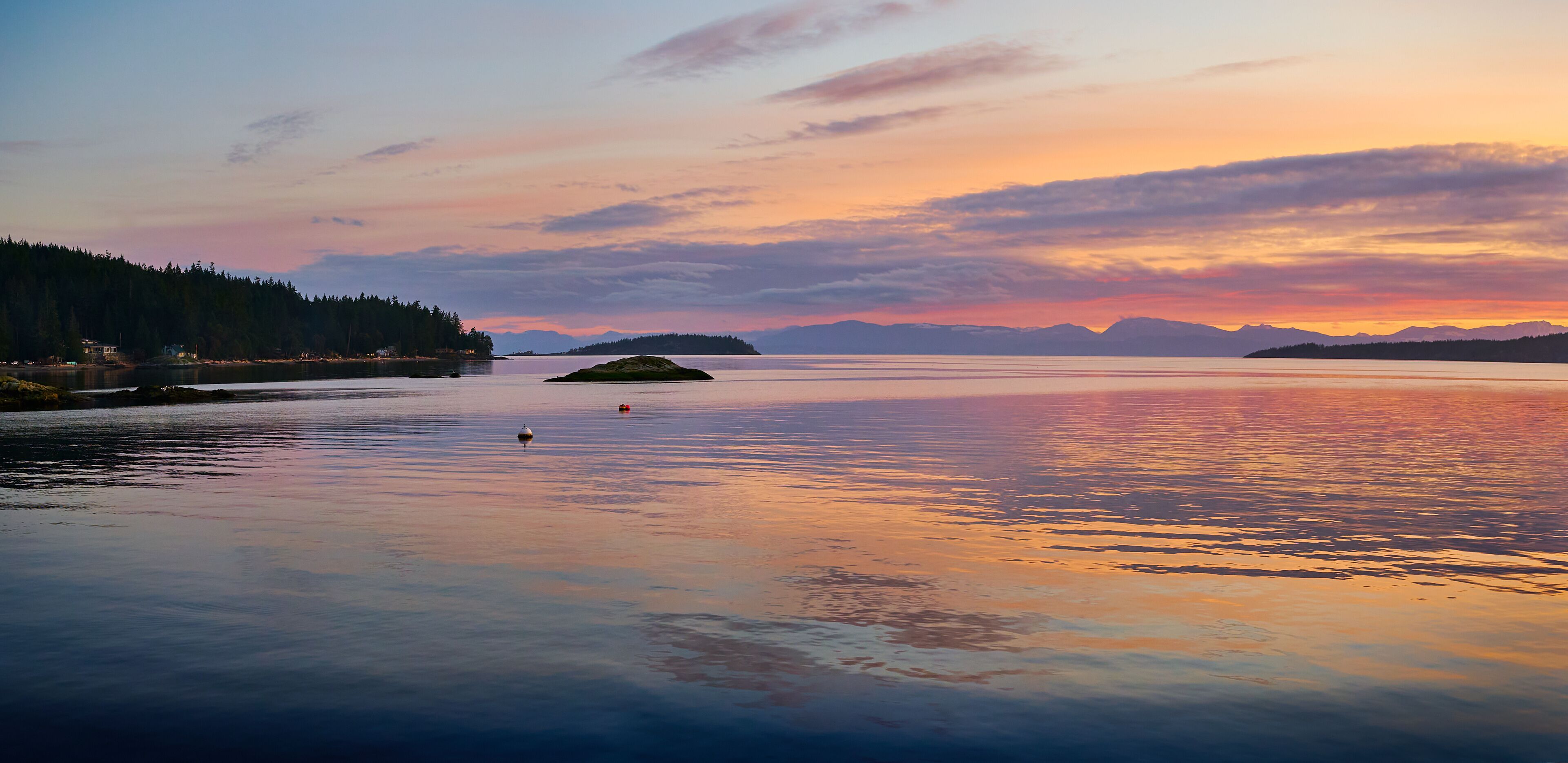 Sunset over the sea Halfmoon Bay. Sunshine Coast, British Columbia, Canada
