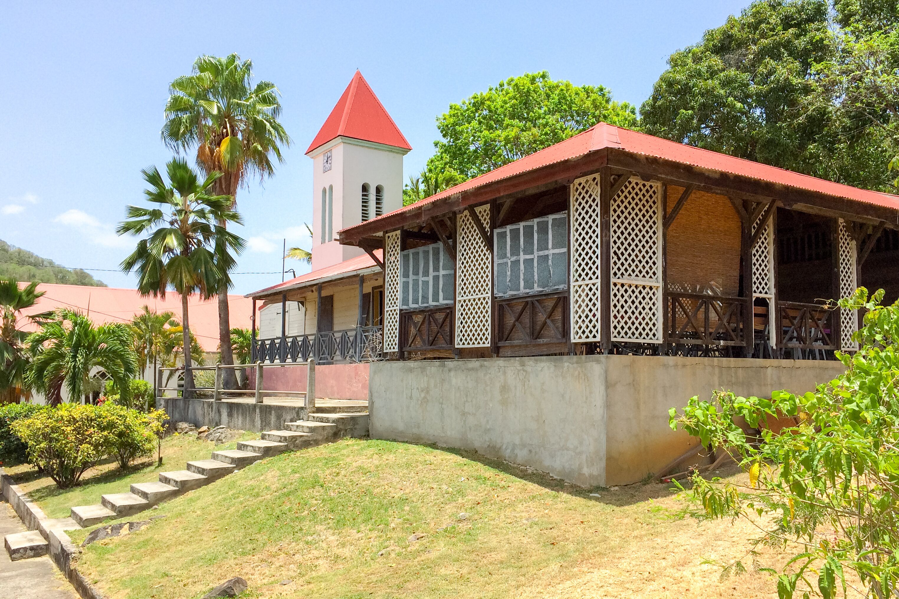 Side view of Deshaies church and surrounding buildings, Shutterstock ID 749482069, SF SSA Case with Manager Approval: Case 07151371, Job: Prepay credit, Client/Licensee: , Other: