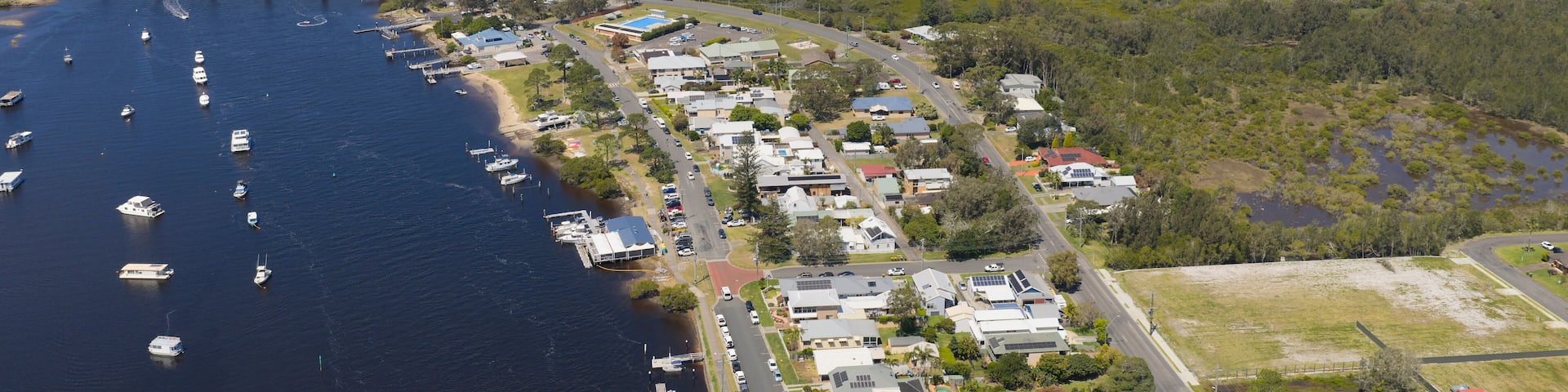The New South Wales north coast town of Tea Gardens and the Myall river .