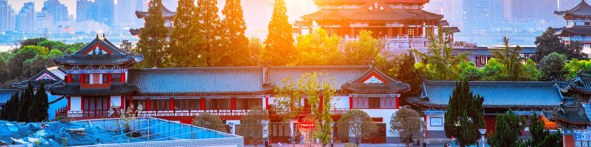 The combination of urban architecture and old architecture in Nanchang, China (the Chinese character in the ancient building is Tengwang Pavilion)