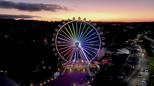 Stunning Ferris Wheel At Canela In Rio Grande Do Sul Brazil. Illuminated Ferris Wheel. Landmark Building. Sunset Scenery. Canela Brazil. Stunning Ferris Wheel At Canela In Rio Grande Do Sul Brazil.