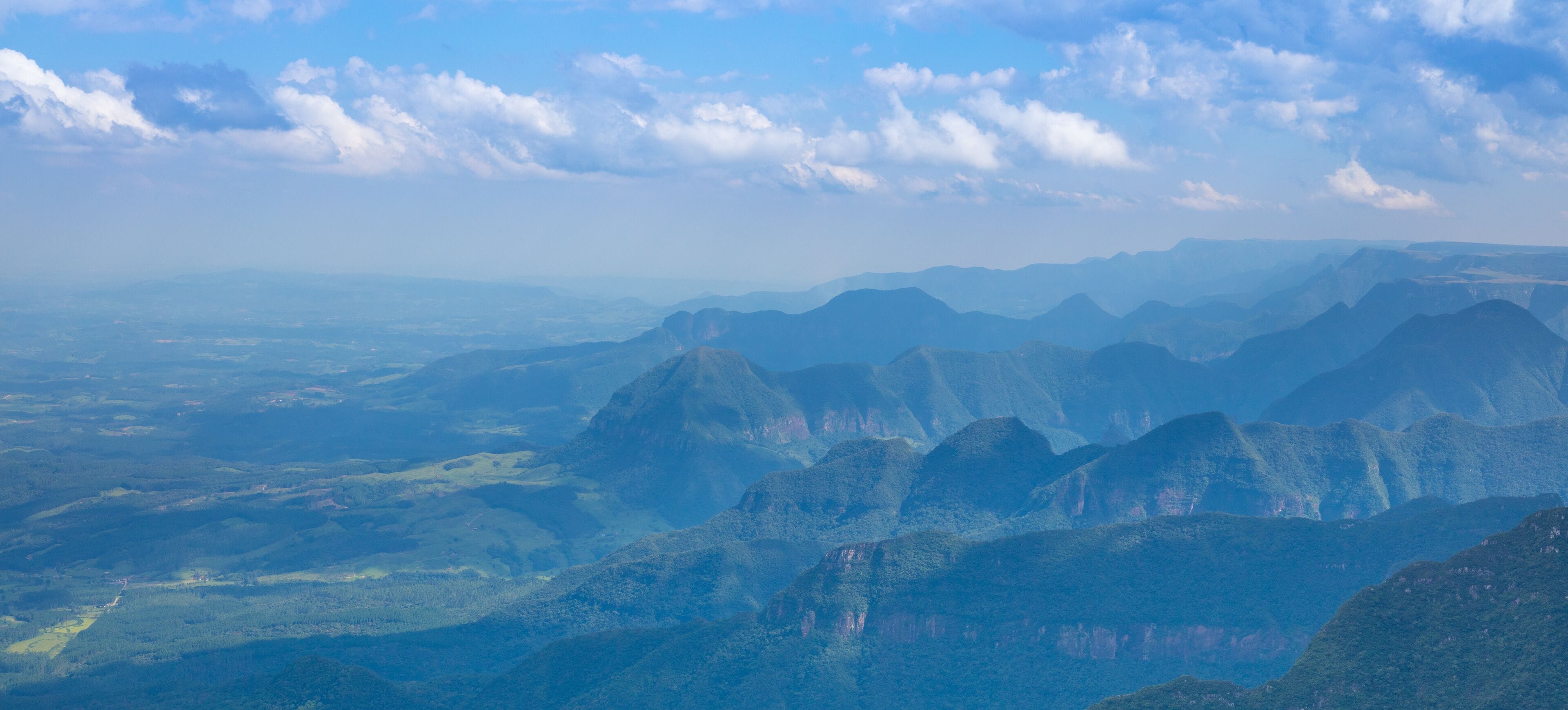 A mountainous landscape with a clear sky.