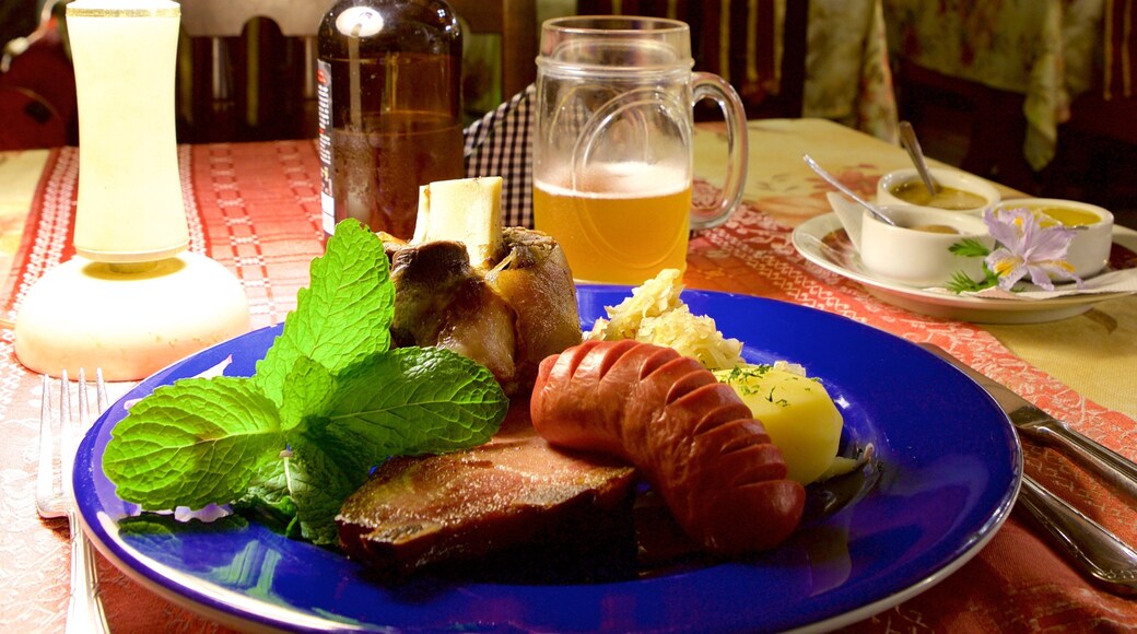 Gramado featuring food and drinks or beverages